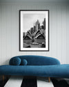 Framed Sydney Opera House fine art print overlooking Sydney Harbour, displayed in a modern Australian interior.